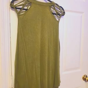 Very cute lime green top with cut outs as cap sleeves with long flared bottom